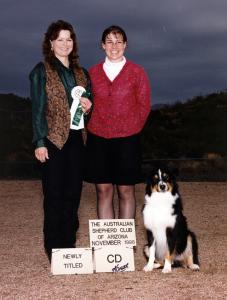 Cody finishing his ASCA CD with a 4th place in Novice B, and a score of 187.5 under Judge Glenda Teaff. ASCAZ Silver Specialty, Phoenix, AZ November 28, 1998.          